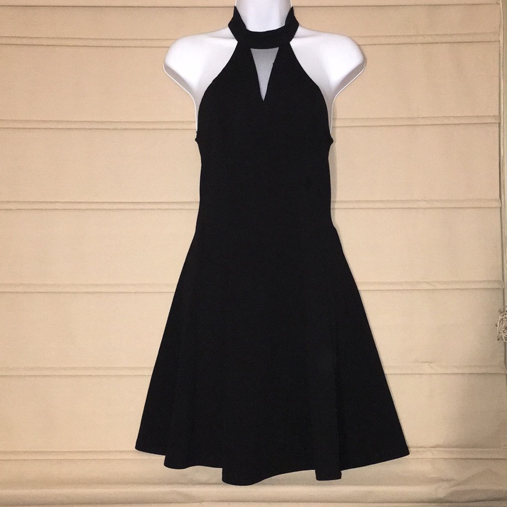 Monteau dress size S with zipper on the back.